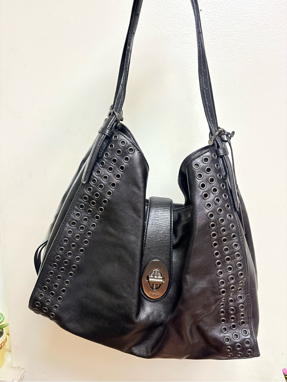 Coach studded grommet carlyle bag